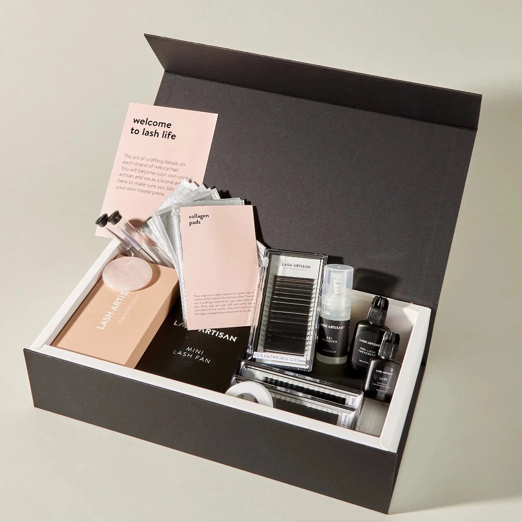A box of Lash Artisan's basic eyelash and brow supplies.