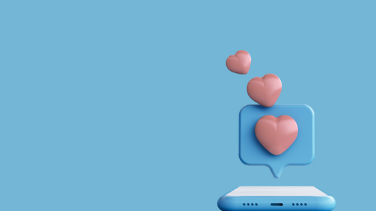 Heart-shaped icons above a smartphone on a blue background