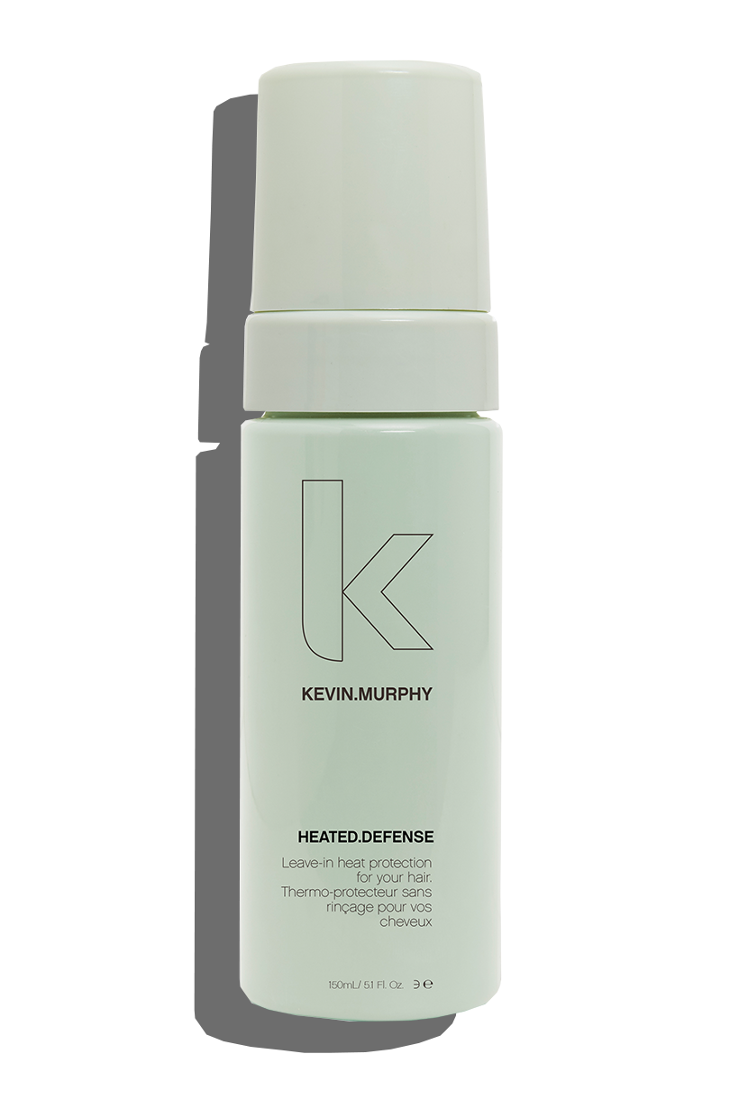 Kevin Murphy - heated defense 150ml  hair against daily life’s biggest aggressor, heat damage. HEATED.DEFENSE is a weightless and invisible leave-in treatment foam to protect your hair against damage associated with heated and mechanical tools. Providing heat protection up to 232˚C / 450˚F, this leave-in foam distributes easily and disappears in all hair types, providing a weightless protective shield.